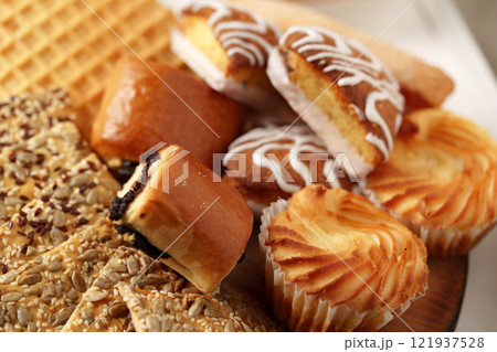 Delightful assortment of traditional pastries and sweets arranged artfully on a platter Delightful assortment of traditional pastries and sweets arranged artfully on a platter 121937528