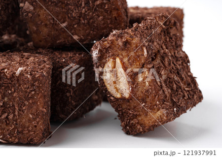 Chocolate oat squares arranged in a stack for a healthy snack option 121937991