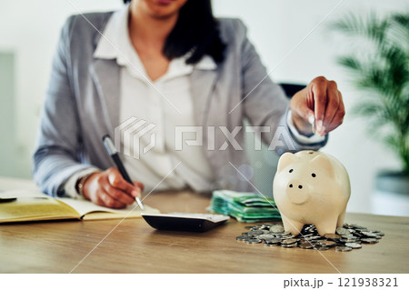 Finance, planning and saving with budget tracking, counting personal finances and family money management. Woman calculating cash and coins in piggy bank for future bills, retirement or holiday funds 121938321