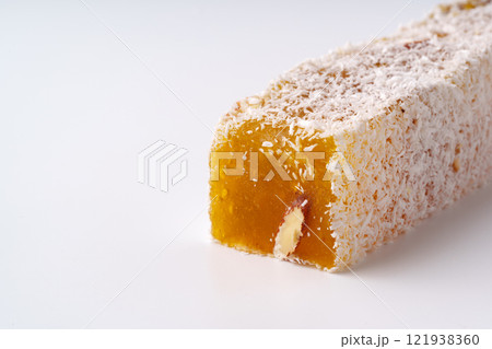 Delicious Turkish delight coated in coconut ready to be enjoyed at a dessert gathering 121938360