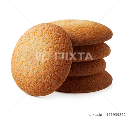 Freshly baked round cookies stacked on a clean surface ready for enjoyment 121939222