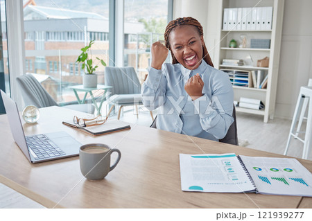 Cheering, celebrating and successful business analyst excited after analyzing laptop data, paperwork chart and profit report. Portrait of smiling, happy and winning woman with company growth mindset 121939277