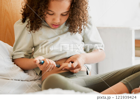 Diabetes, insulin and diabetic girl injecting treatment in her bedroom as a health morning routine at home. Medicine, house and testing to monitor blood sugar levels, wellness and medical healthcare Diabetes, insulin and diabetic girl injecting treatment in her bedroom as a health morning routine at home. Medicine, house and testing to monitor blood sugar levels, wellness and medical healthcare 121939424