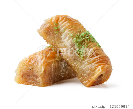 Delightful baklava pieces topped with pistachio, showcasing traditional dessert artistry 121939954
