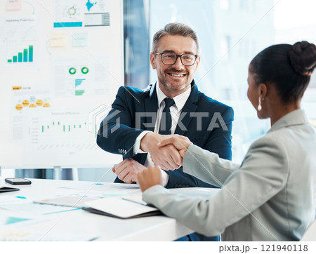 Formal, corporate meeting and handshake or business deal between workers. Partnership, trust and professional relationship with executives. Cooperation, agreement or contract with client or staff. 121940118