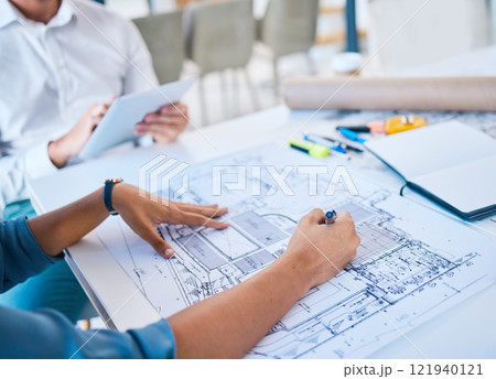 Architect sketching, designing blueprint or doing architecture, engineering or structure drawing on paper at a work studio with hands closeup. Business person working on a design project development 121940121