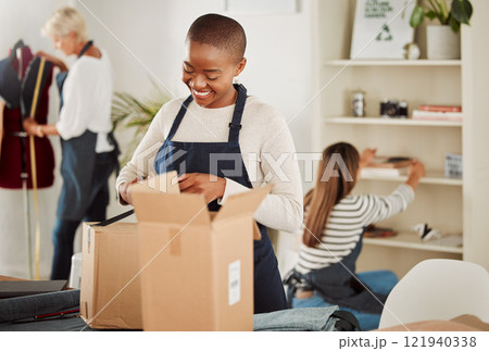 Clothing expert happy with the product, service and packaging. Fashion studio or factory for creative and skilled people. Dressmaker, designer and team get delivery of boxes with export materials Clothing expert happy with the product, service and packaging. Fashion studio or factory for creative and skilled people. Dressmaker, designer and team get delivery of boxes with export materials 121940338