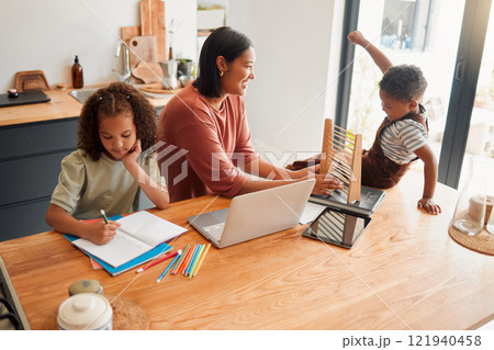 Homeschool, education and distance learning for children while mother helps son and daughter. Parent teaching and bonding with kids with home school homework, and education test for math and English 121940458