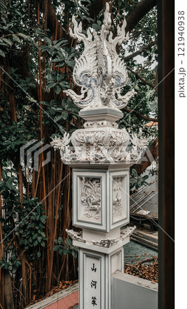 An Elegant and Majestic Dragon Sculpture Set in a Serene and Tranquil Garden Environment An Elegant and Majestic Dragon Sculpture Set in a Serene and Tranquil Garden Environment 121940938