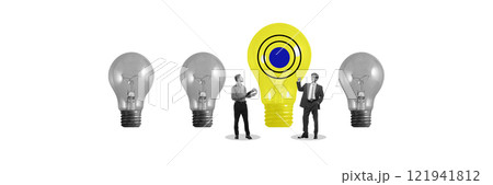 Business people standing near oversized yellow light bulb among smaller gray light bulbs, symbolizing creative ideas and innovation. Conceptual design 121941812