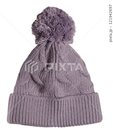 Knitted woolen pink hat with pompom on isolated background 121942697