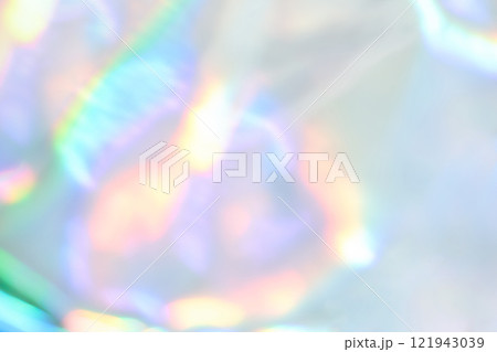 Abstract pastel holographic light blur with iridescent rainbow pattern in soft 121943039