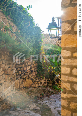Narrow street in Ulcinj Old Town in Montenegro, the southernmost city at Montenegrin coast, Europe 121945816