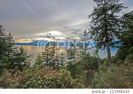 Scenic view over Howe Sound near Vancouver with mountains and water under cloudy sky Scenic view over Howe Sound near Vancouver with mountains and water under cloudy sky 121946283