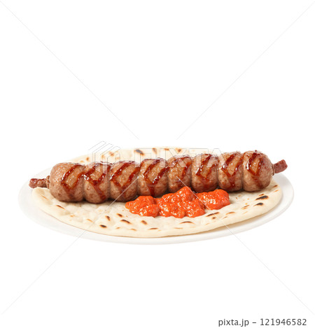 Cevapi Grilled Balkan minced meat sausages served with fluffy flatbread, diced onions, and a dollop of ajvar. Steam and crumbs Cevapi Grilled Balkan minced meat sausages served with fluffy flatbread, diced onions, and a dollop of ajvar. Steam and crumbs 121946582