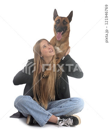 malinois and owner in studio 121946769