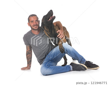 malinois and owner in studio 121946771