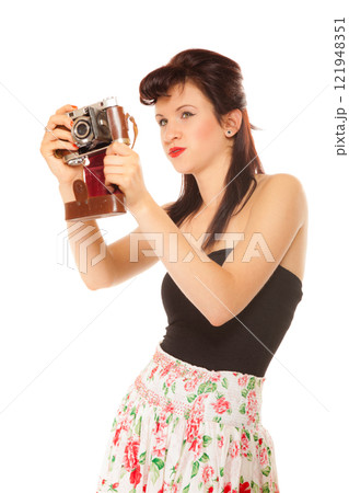 Lovely teen girl with old camera Lovely teen girl with old camera 121948351