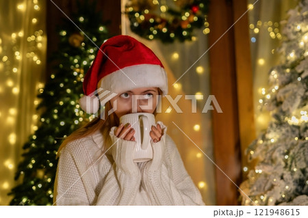 Christmas Girl Hot Chocolate Festive Decorated Room 121948615
