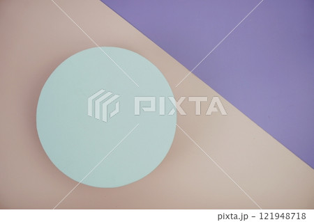 Top view of empty white cirle on pink and purple geometric background 121948718