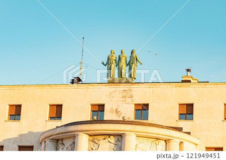 Elegant corner building with classical architecture against a clear blue sky in Belgrade, Serbia. Perfect for urban design, travel, and historical content. High quality photo Elegant corner building with classical architecture against a clear blue sky in Belgrade, Serbia. Perfect for urban design, travel, and historical content. High quality photo 121949451