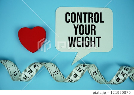Control Your Weight text on speech bubble with red heart and measure tape top view on blue background 121950870