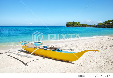 Bangka boat on a beach, Malapascua Island, Philippines. Bangka boat on a beach, Malapascua Island, Philippines. 121950947