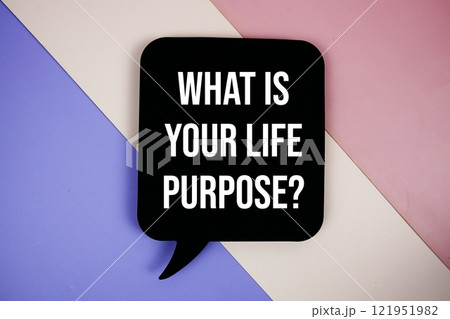 What is your life purpose? text on speech bubble top view on purple geometric background What is your life purpose? text on speech bubble top view on purple geometric background 121951982
