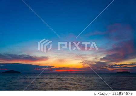 Nature beautiful Light Sunset or sunrise over sea,Colorful light majestic scenery Sky with Amazing clouds and waves in sunset sky wonderful light cloud background 121954678