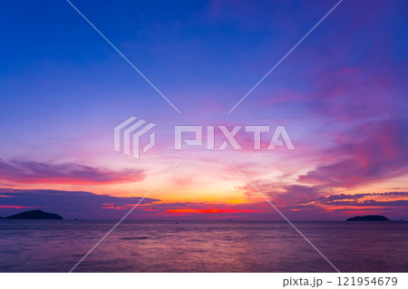 Nature beautiful Light Sunset or sunrise over sea,Colorful light majestic scenery Sky with Amazing clouds and waves in sunset sky wonderful light cloud background 121954679