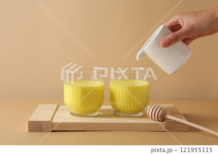 Moon or turmeric milk, concept of tasty drink 121955115