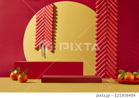 Front view of some empty red podium for presentation product, a plate of tangerines and some firecracker string are highlight the picture. Scene for advertising products on Chinese New Year-themed. 121956484