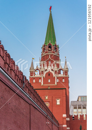Troitskaya tower of Moscow Kremlin on a blue sky background in sunny summer day 121956592