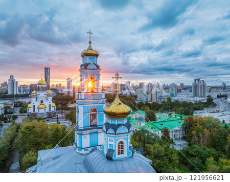 Summer Yekaterinburg, Temple of the Ascension and Temple on Blood in beautiful clear sunset. Summer Yekaterinburg, Temple of the Ascension and Temple on Blood in beautiful clear sunset. 121956621