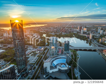Yekaterinburg city and pond aerial panoramic view at summer or early autumn sunset. Night city in the early autumn or summer. 121956648