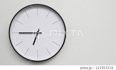Wall Clock Showing 18.45/06.45 O'Clock on White Wooden Surface - Perfect for Time Management and Scheduling Concepts Wall Clock Showing 18.45/06.45 O'Clock on White Wooden Surface - Perfect for Time Management and Scheduling Concepts 121957214