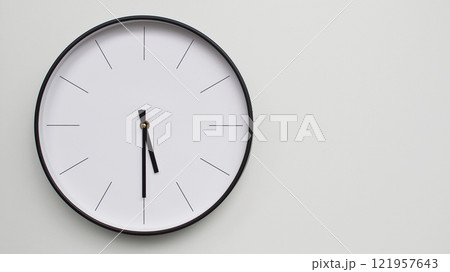 Wall Clock Showing 17.30/05.30 O'Clock on White Wooden Surface - Perfect for Time Management and Scheduling Concepts 121957643