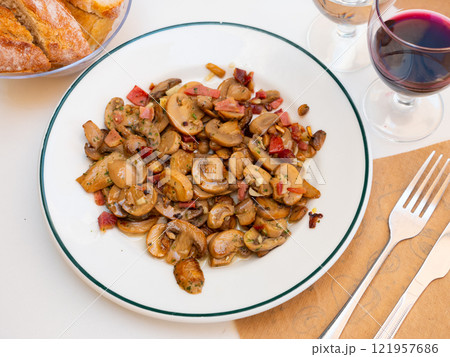 Sauteed Mushrooms served on white plate Sauteed Mushrooms served on white plate 121957686