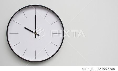 Wall Clock Showing 10.00/22.00 O'Clock on White Wooden Surface - Perfect for Time Management and Scheduling Concepts Wall Clock Showing 10.00/22.00 O'Clock on White Wooden Surface - Perfect for Time Management and Scheduling Concepts 121957780
