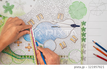 Garden design courses student is learning fundamentals garden design and planning. 121957821