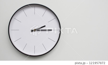 Wall Clock Showing 14.15/02.15 O'Clock on White Wooden Surface - Perfect for Time Management and Scheduling Concepts Wall Clock Showing 14.15/02.15 O'Clock on White Wooden Surface - Perfect for Time Management and Scheduling Concepts 121957872