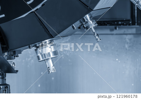 The indexable tool in the tool magazine of machining center in the light blue scene. 121960178