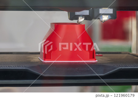 Close up scene the additive manufacturing by 3D printer machine. 121960179