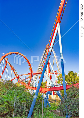 Roller Coaster in funny amusement park. Roller Coaster in funny amusement park. 121961332
