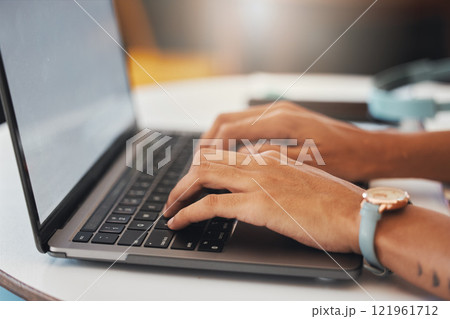 Womans hands typing on a laptop, writing an email or browsing social media and banking. Close up of female hands on a computer looking up stocks, reading the news and working on the online network. Womans hands typing on a laptop, writing an email or browsing social media and banking. Close up of female hands on a computer looking up stocks, reading the news and working on the online network. 121961712