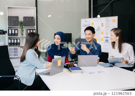 Creative business people working on business project in office 121962563