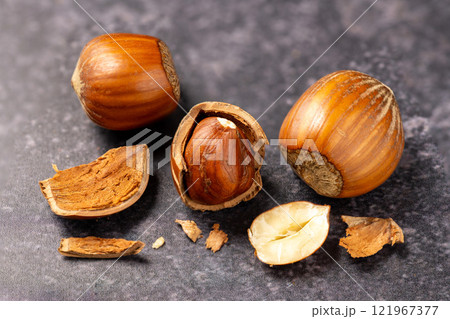 Hazelnuts on dark background 121967377