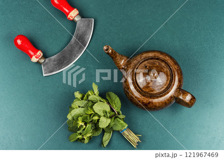 Green tea on table. 121967469