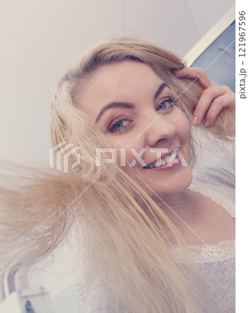 Woman with wet blonde hair Woman with wet blonde hair 121967596