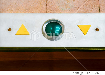 Up down.Elevator movement indicator board for floors in the building entrance 121968616